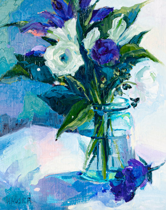 Purple and White flowers in Glass